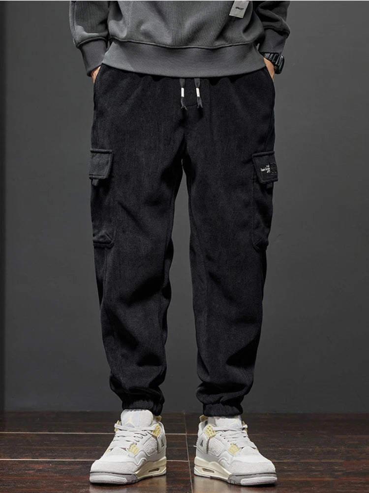 Frühling Herbst Neue Stil Elastische Taille Casual Hosen für Männer Stretch Gerade Kordelzug Harem Jogging Sport Lange Hosen Männlich