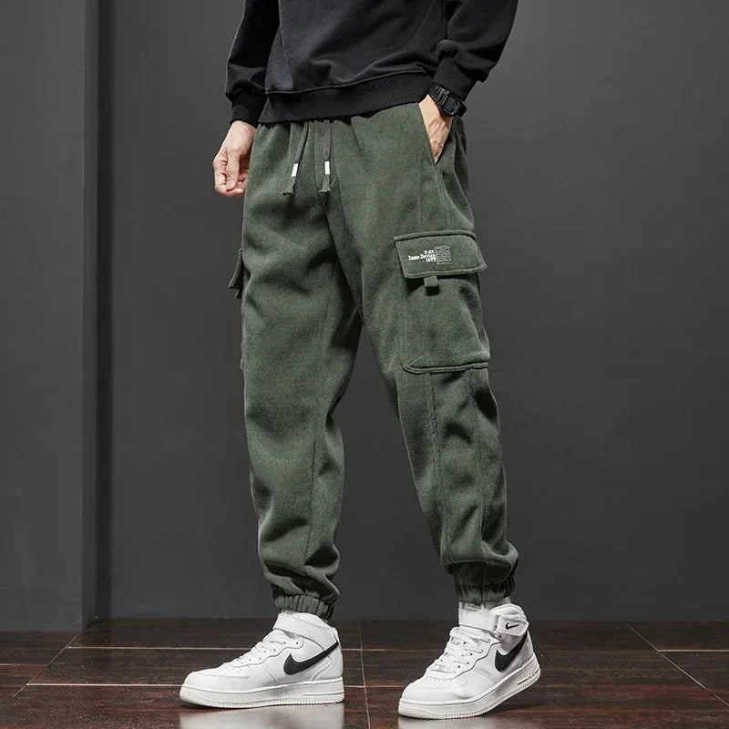 Frühling Herbst Neue Stil Elastische Taille Casual Hosen für Männer Stretch Gerade Kordelzug Harem Jogging Sport Lange Hosen Männlich