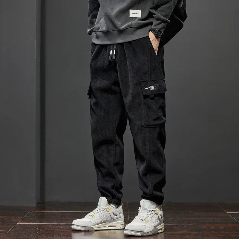 Frühling Herbst Neue Stil Elastische Taille Casual Hosen für Männer Stretch Gerade Kordelzug Harem Jogging Sport Lange Hosen Männlich