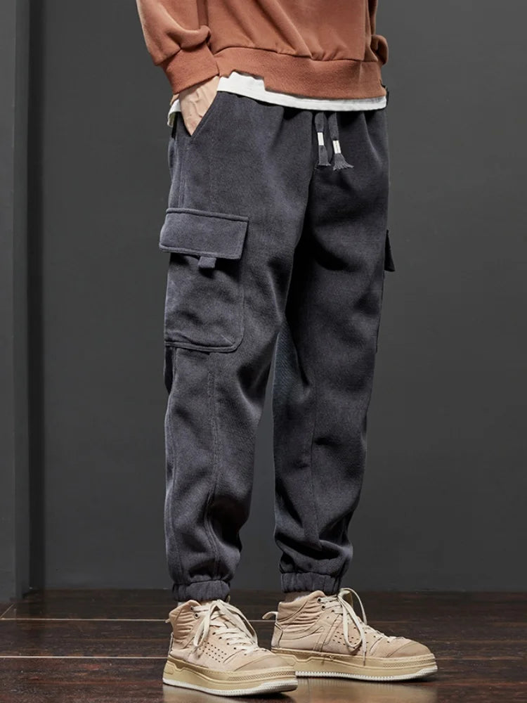 Frühling Herbst Neue Stil Elastische Taille Casual Hosen für Männer Stretch Gerade Kordelzug Harem Jogging Sport Lange Hosen Männlich