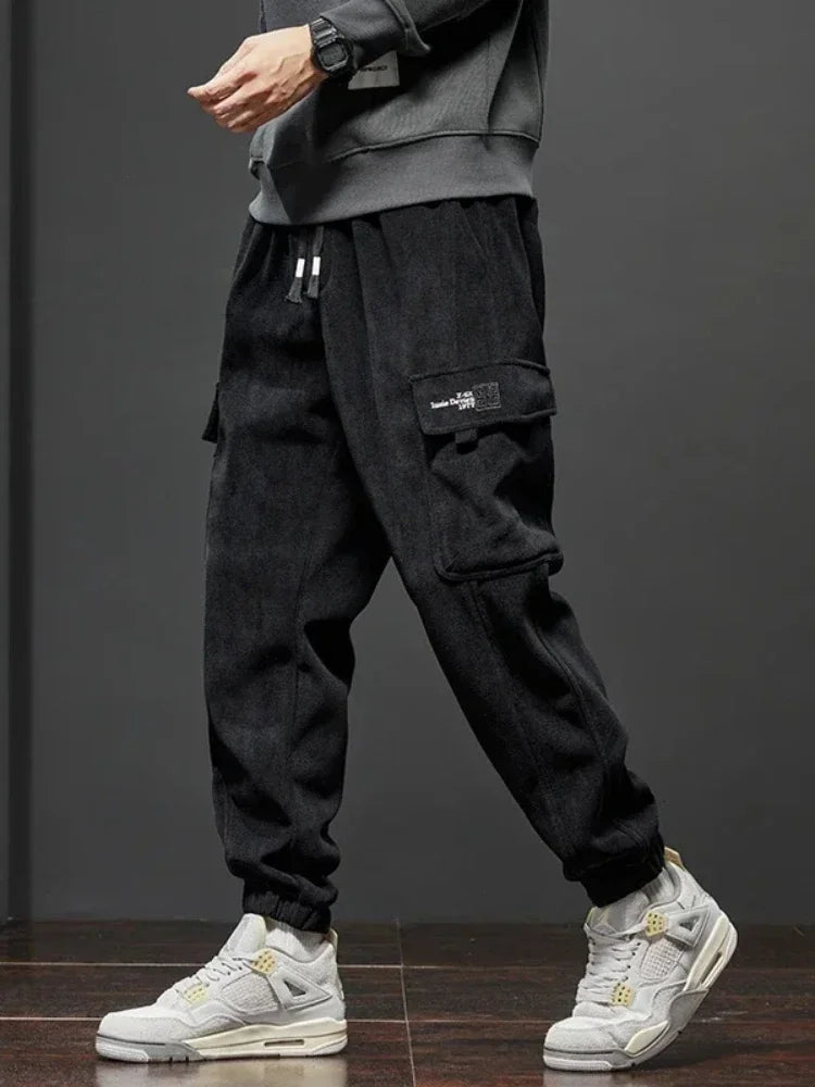 Frühling Herbst Neue Stil Elastische Taille Casual Hosen für Männer Stretch Gerade Kordelzug Harem Jogging Sport Lange Hosen Männlich