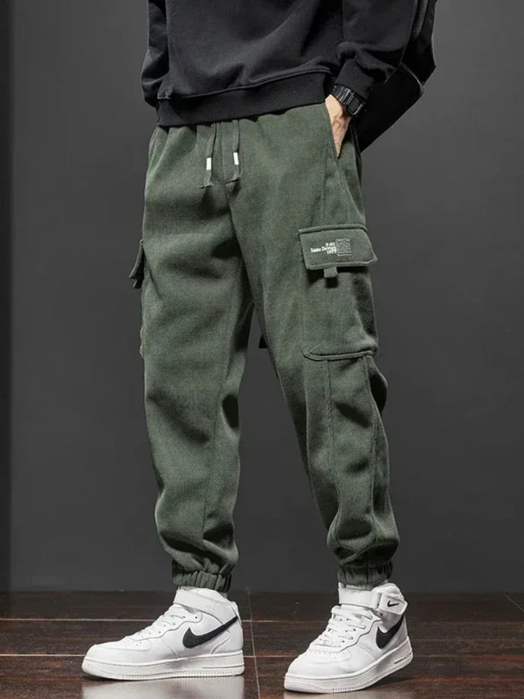 Frühling Herbst Neue Stil Elastische Taille Casual Hosen für Männer Stretch Gerade Kordelzug Harem Jogging Sport Lange Hosen Männlich