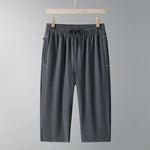 Men's Ice Silk Seven-Quarter Pants 2025 Summer Thin Riding Breeches Loose-Fit Quick-Drying Casual Solid Sports Mid-Waist Shorts - flohmarkt-deutschland.shop